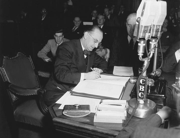 Fig. 5. Unknown. “Mr. Joseph Smallwood signing the agreement which admitted Newfoundland into Confederation.” Library and Archives Canada, 3194648, National …