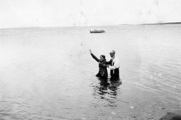 Fig. 62. Anderson, Gustav. “Baptism of woman, Carmanville Harbour.” The Rooms Archive, VA 14–223, Newfoundland Tourist Development Board Photograph Collectio…