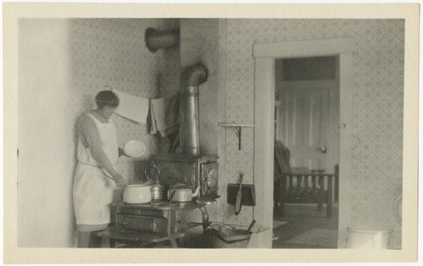 Fig. 67. Edwards, H.T. “Woman cooking.” The Rooms Archive, IGA 15–69, International Grenfell Association Photograph Collection, before 1935.